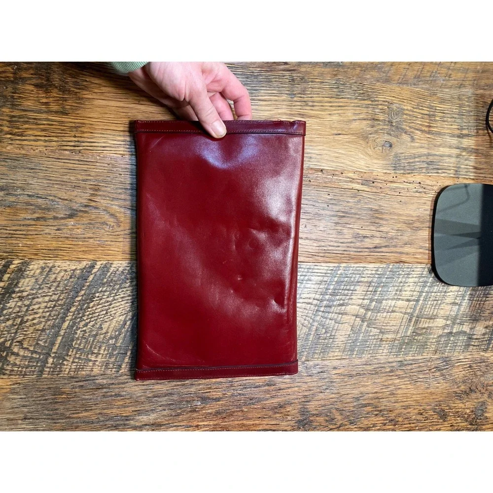 Elegant‎ Burgundy Etienne Aigner Leather Clutch Handbag with Gold Oval Accent